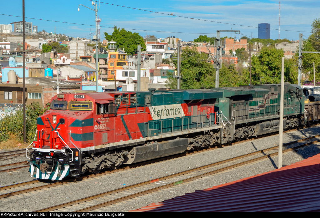 FXE ES44AC Locomotive leading a train